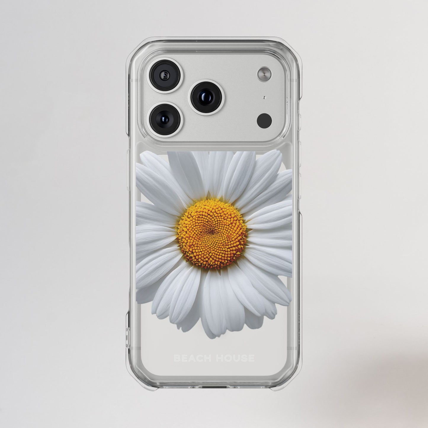 Phone case with a white daisy design on a light gray background