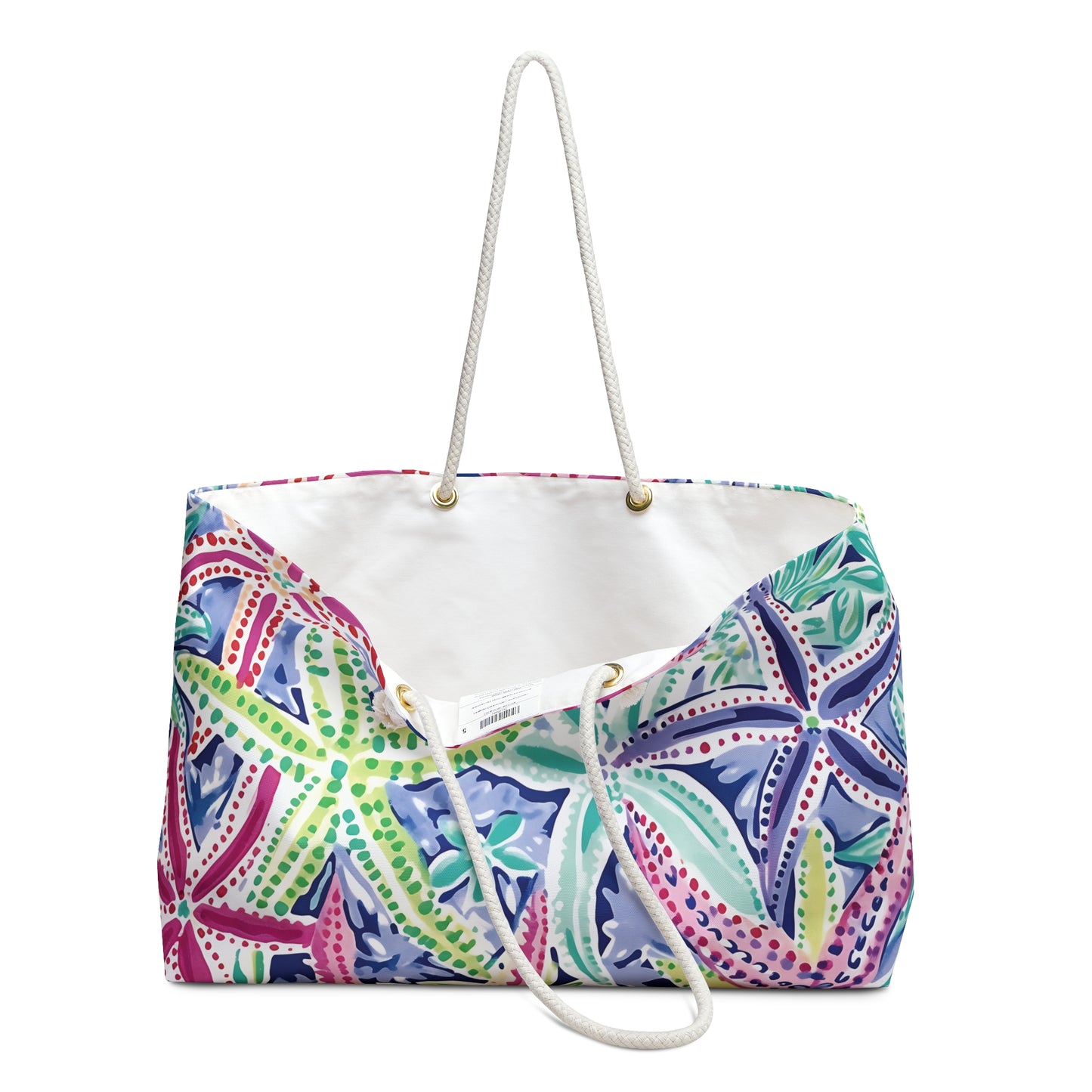 Siesta Key Weekender Tote Bag slightly opened to show cream lined interior and vibrant tropical exterior on a white background.