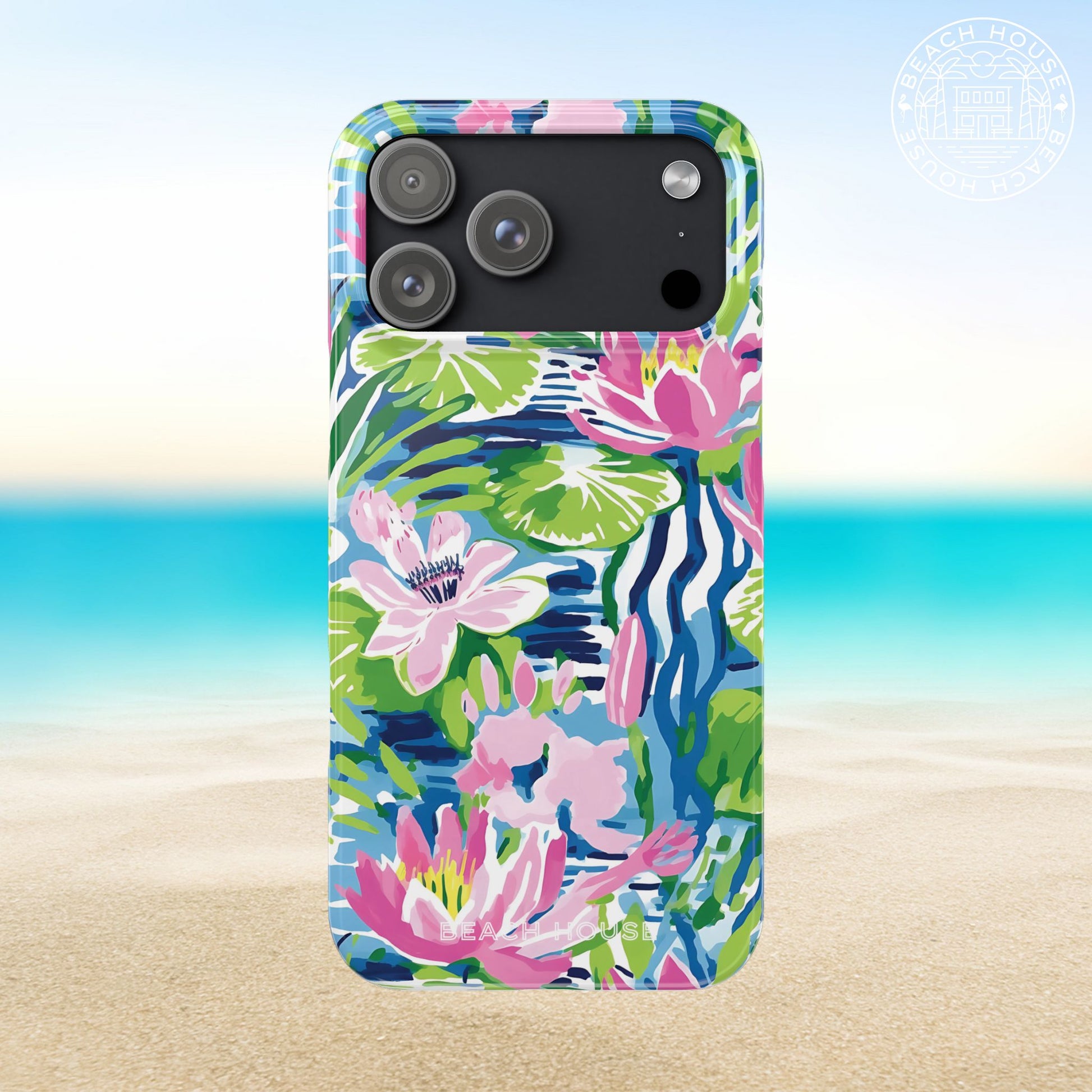 Everglades Slim Case for iPhone 17 Pro Max with colorful floral design on a beach background