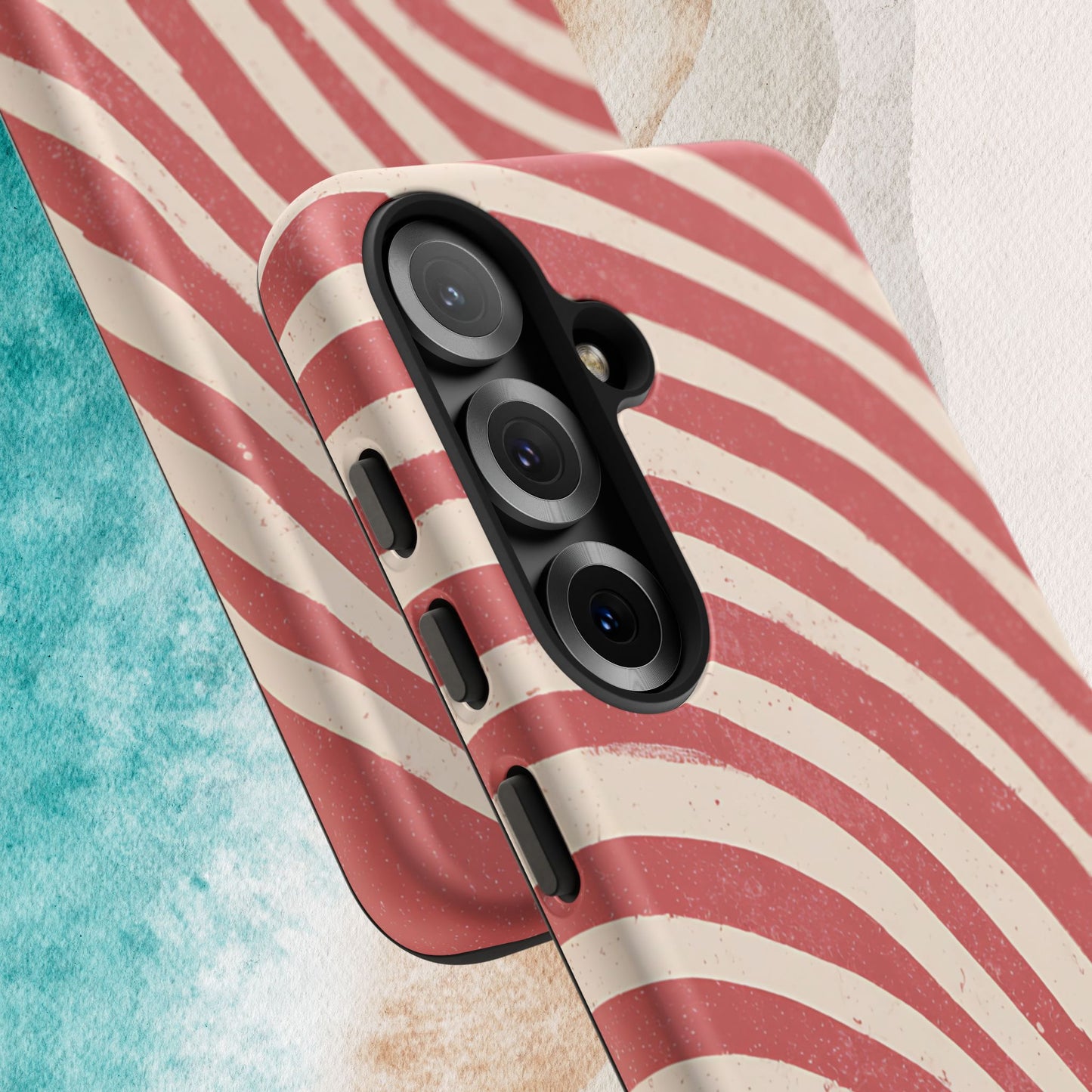Kure Beach Tough Case for Galaxy with red and white striped pattern on a textured surface