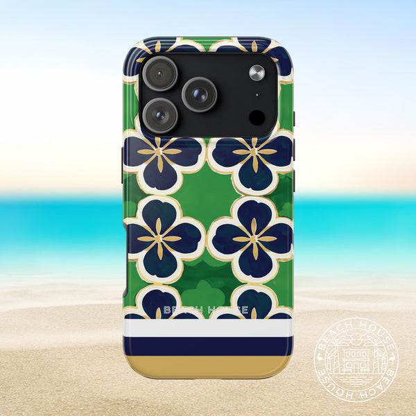 South Bend Tough Case for iPhone 17 Pro with floral pattern on a beach background