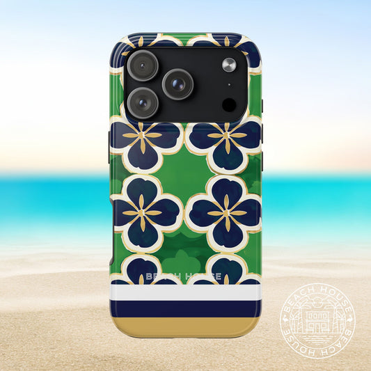 South Bend Tough Case for iPhone 17 Pro with floral pattern on a beach background