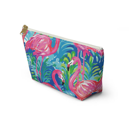 Pouch with flamingo and tropical leaf pattern on a white background