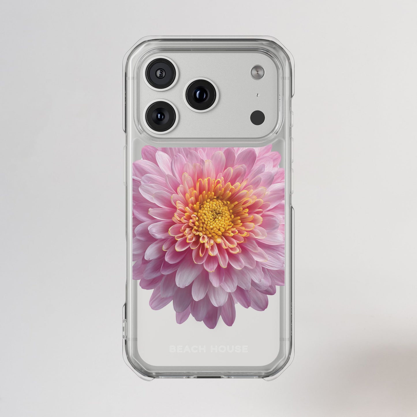 Phone case with a pink flower design on a light gray background