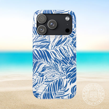 Hampton Slim Case for iPhone 17 Pro with blue palm leaf pattern on a beach background