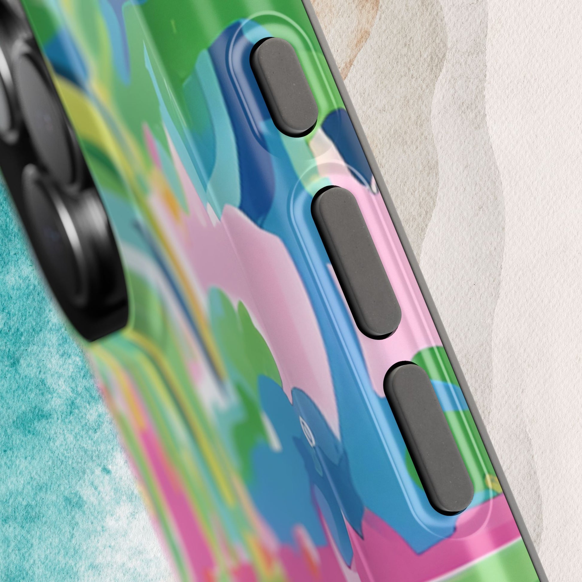 Close up view of Delray MagSafe Tough Case for iPhone with abstract design on a textured surface