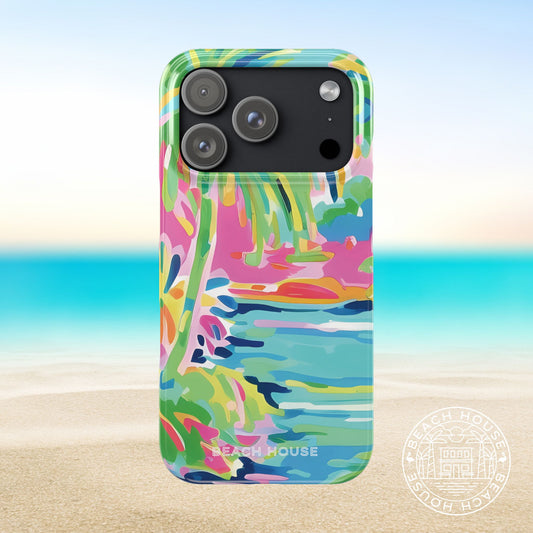 Delray Slim Case for iPhone 17 Pro with vibrant coastal design on a beach background