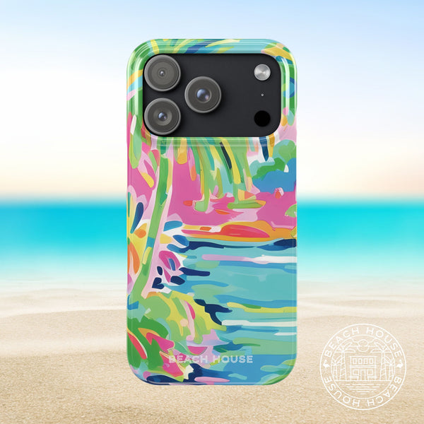 Delray Slim Case for iPhone 17 Pro with vibrant coastal design on a beach background