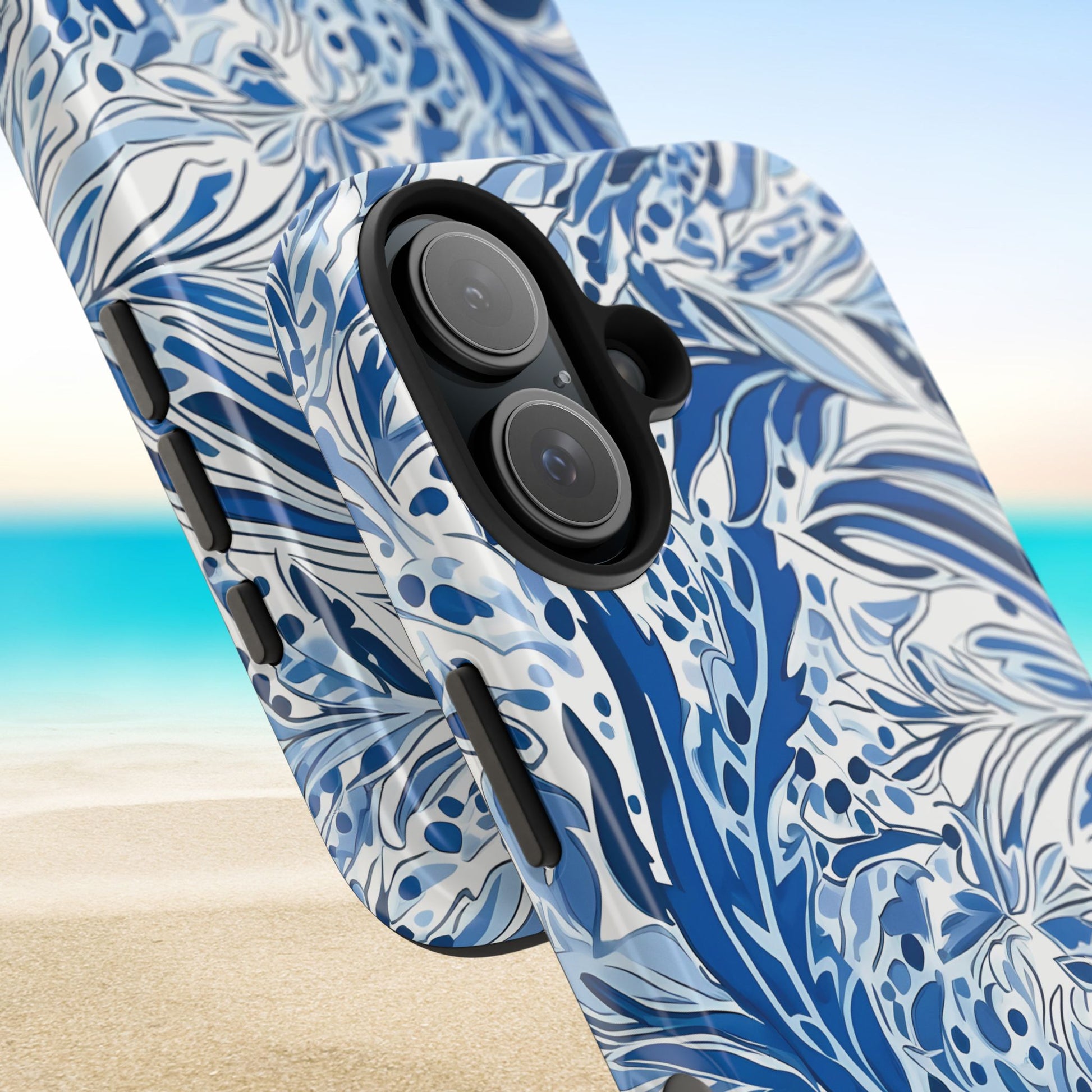 Blue and white floral Nags Head case for iPhone with a beach background