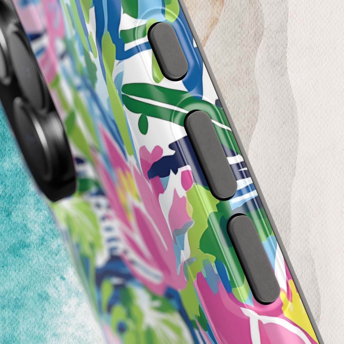 Close up view of the Everglades MagSafe Tough Case for iPhone with abstract design on a textured surface