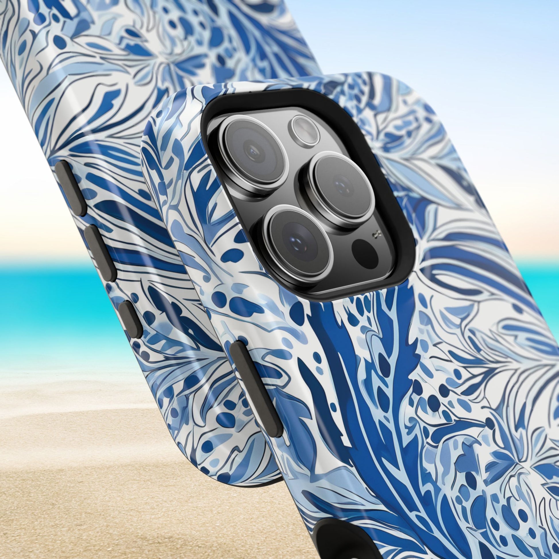 Close up views of the Nags Head MagSafe Tough Case for iPhone with a beach background