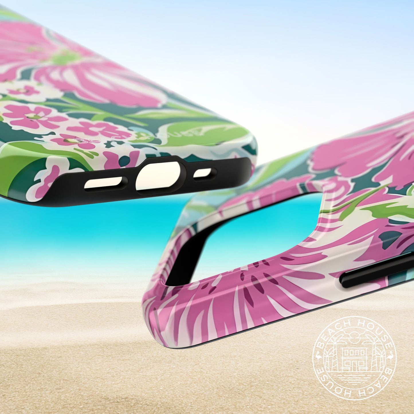 Top and bottom view of the Seaside Tough Case for iPhone on a beach background with a clear sky