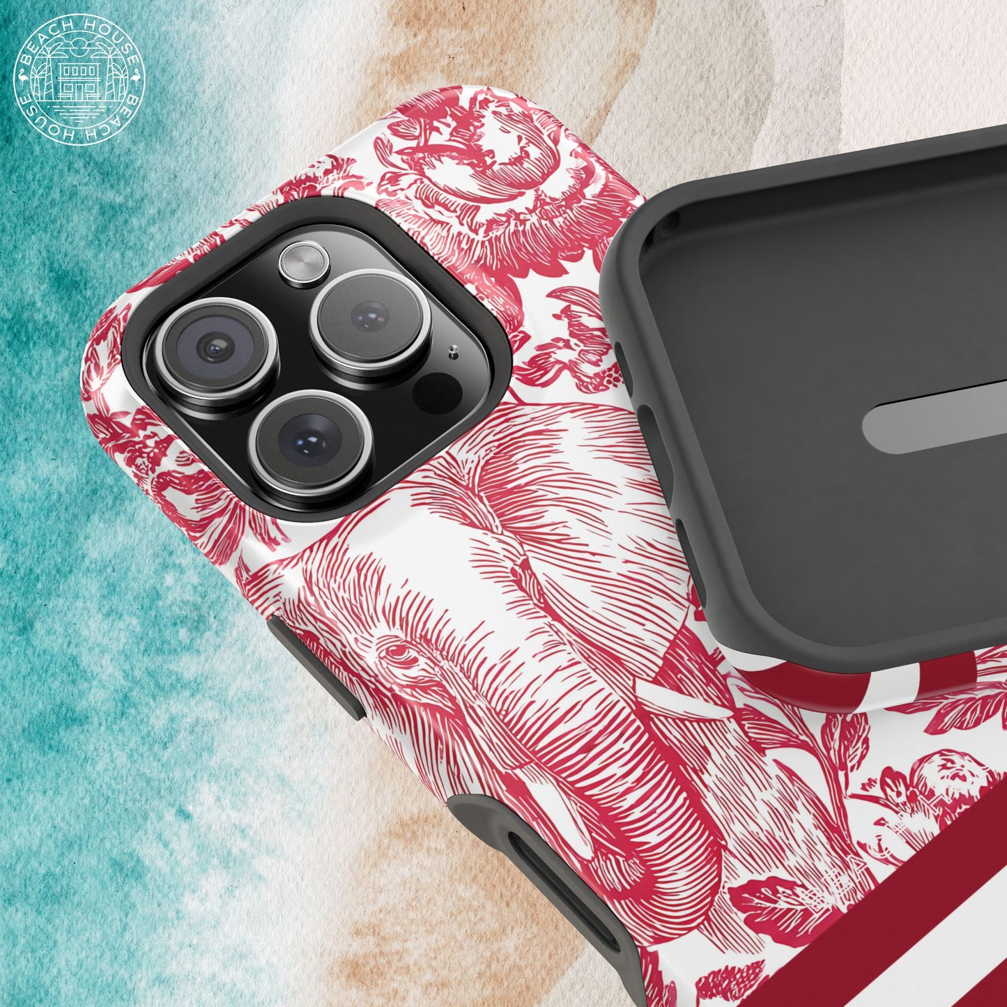 Interior and exterior views of the Tuscaloosa MagSafe Tough Case for iPhone with red floral and elephant design on a textured background