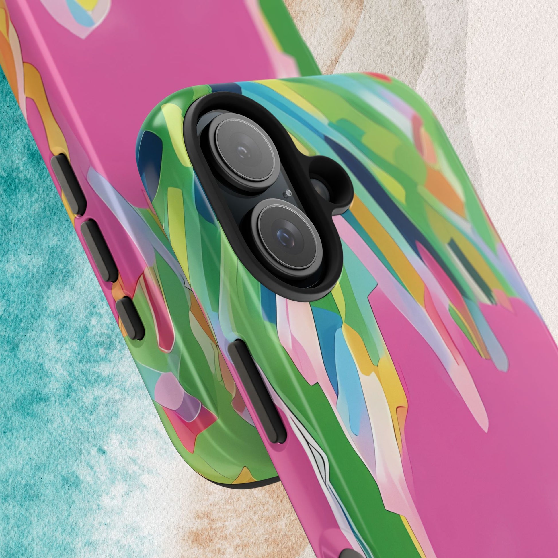 Close up views of the Boca Tough case for iPhone with palm tree design on a textured surface