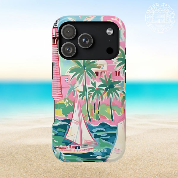 St. Simon MagSafe Tough Case for iPhone 17 Pro with tropical design featuring palm trees and a sailboat, set against a beach background.