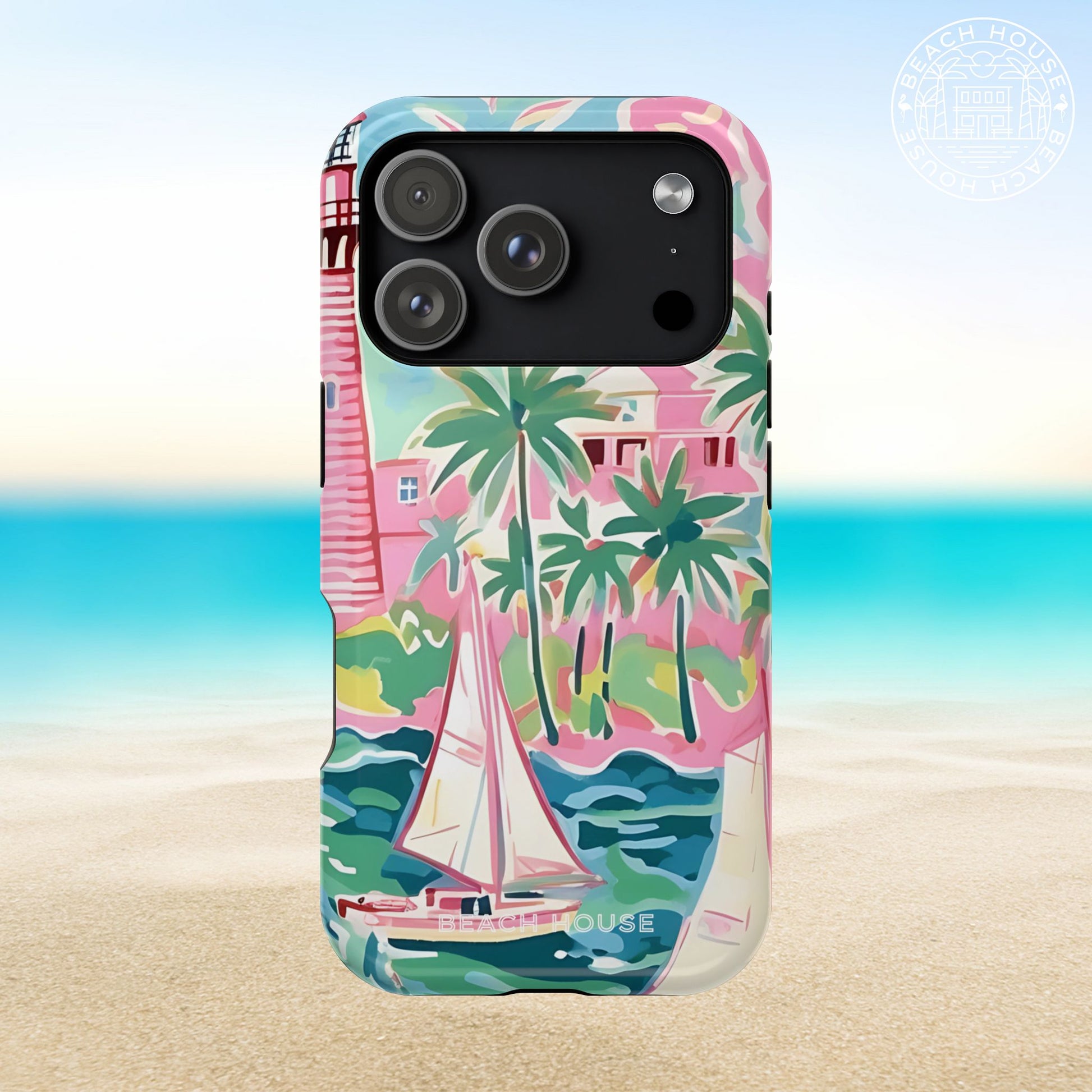 St. Simon MagSafe Tough Case for iPhone 17 Pro with tropical design featuring palm trees and a sailboat, set against a beach background.