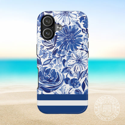 Lexington Tough Case for iPhone 17 with blue floral design on a beach background