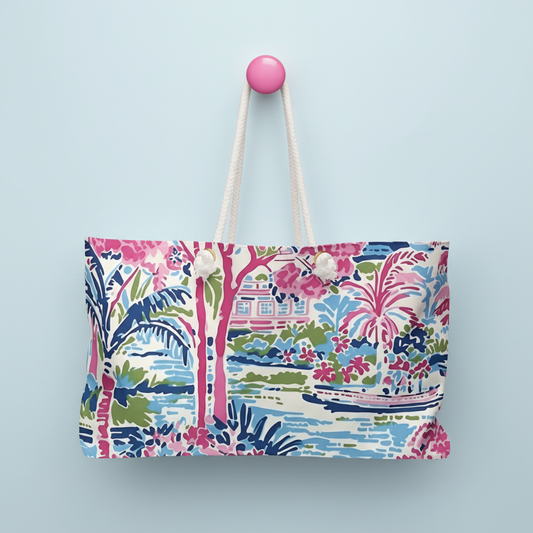 Tropical Amelia Weekender tote bag with a rope handles on a light blue background