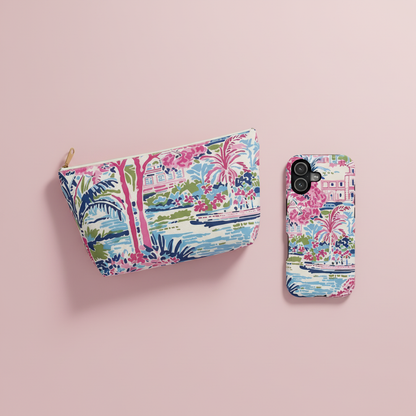 Pouch and phone case with floral and palm tree design on a pink background