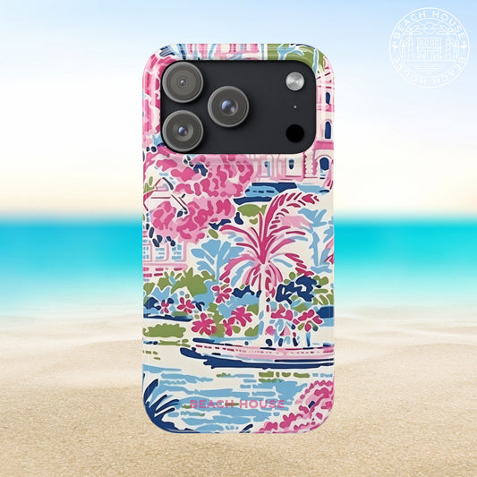 Amelia Slim Case for iPhone 17 Pro with colorful beach-themed design on a sandy background