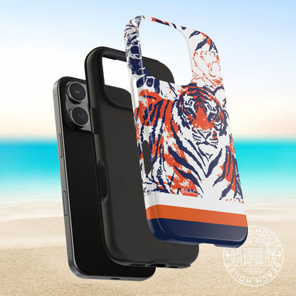 Protective layers of the Auburn Tough Case for iPhone with tiger design on a beach background