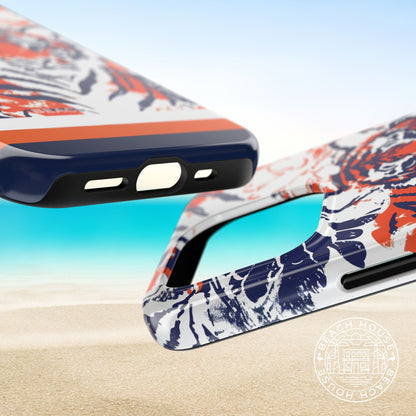 Top and bottom views of the Auburn Tough Case for iPhone on a beach background