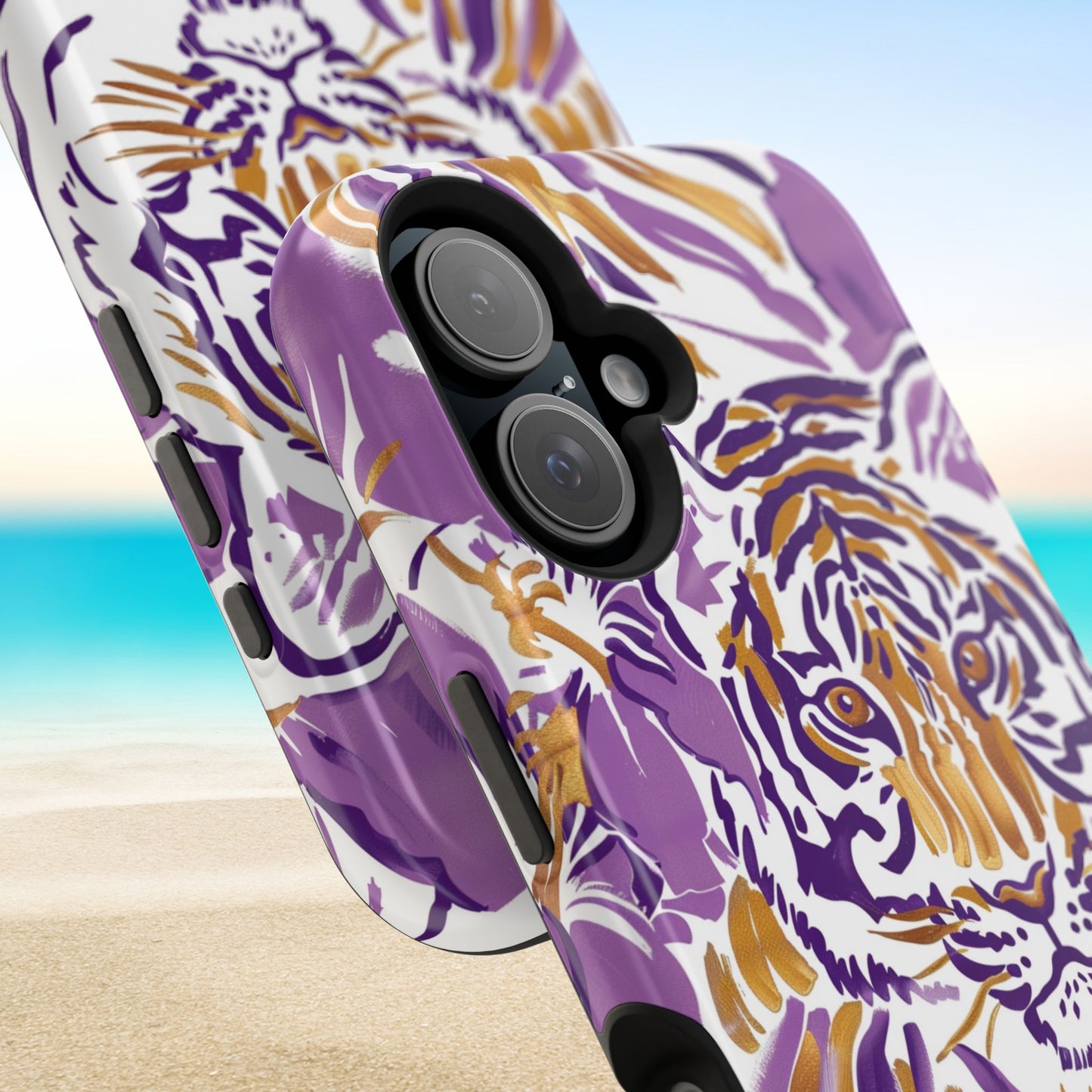 Close up views of the Baton Rouge MagSafe Tough Case for iPhone with a purple and gold tiger design 