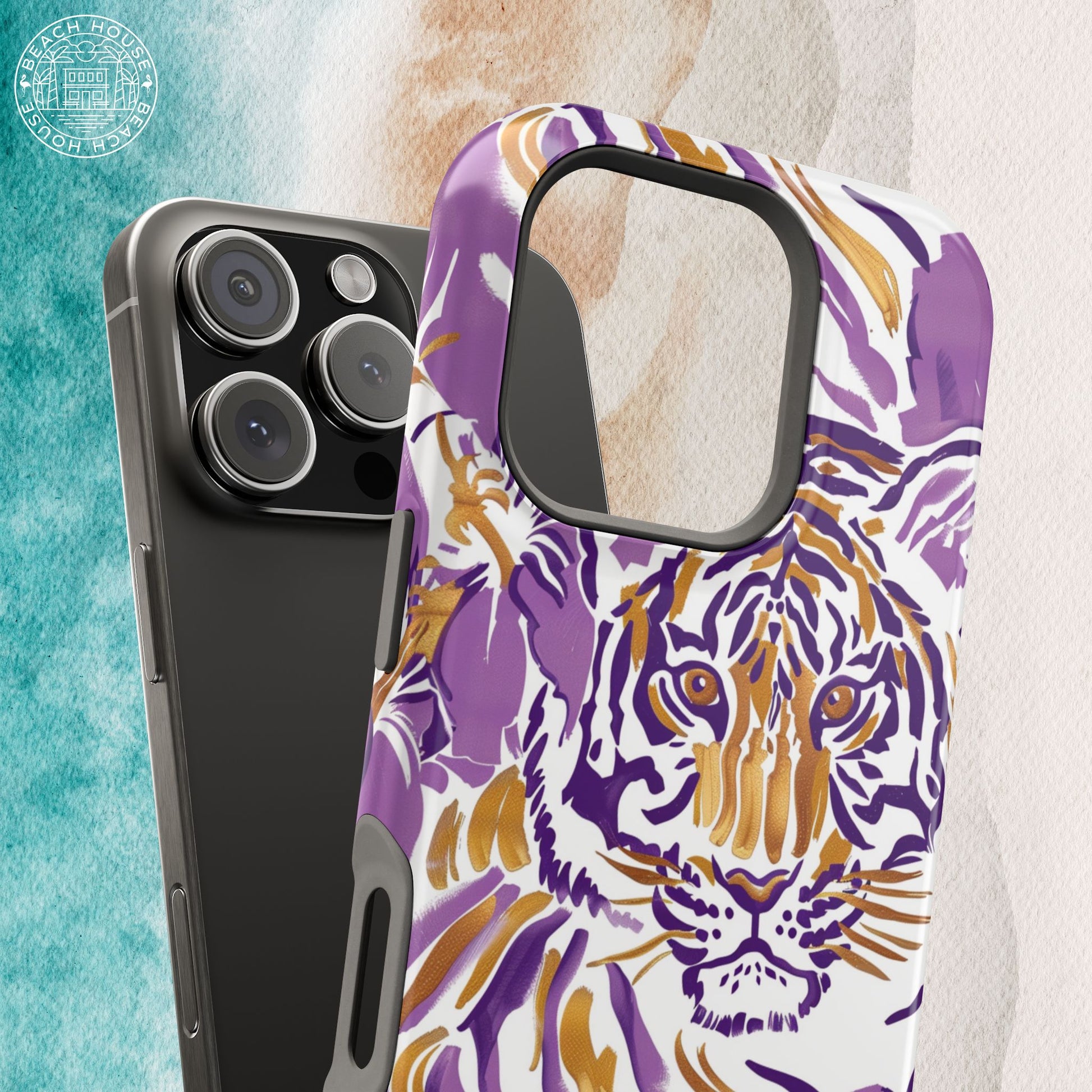 Baton Rouge Phone case with a purple and gold tiger design on a beach background