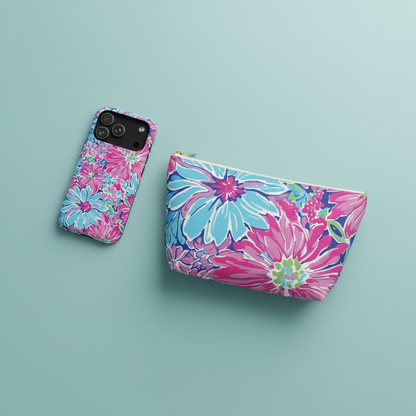 Bimini MagSafe Tough Floral phone case and accessory pouch on a light blue background