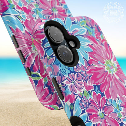 Close up views of the Bimini MagSafe Tough Case for iPhone with pink and blue flowers on a beach background