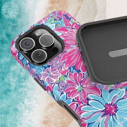 Inside and outside views of the Bimini MagSafe Tough Case for iPhone on a textured surface