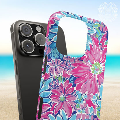 Snap on style Bimini Slim Case for iPhone with pink and blue floral design on a beach background