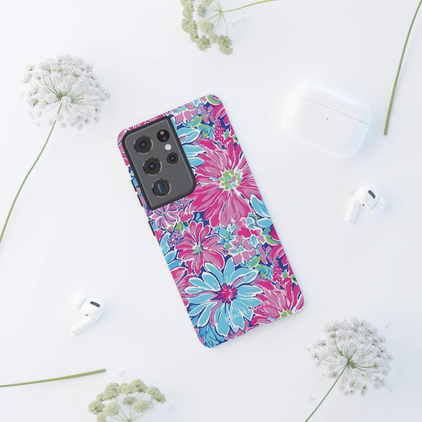Bimini Tough Case for Galaxy case on a white surface with flowers around