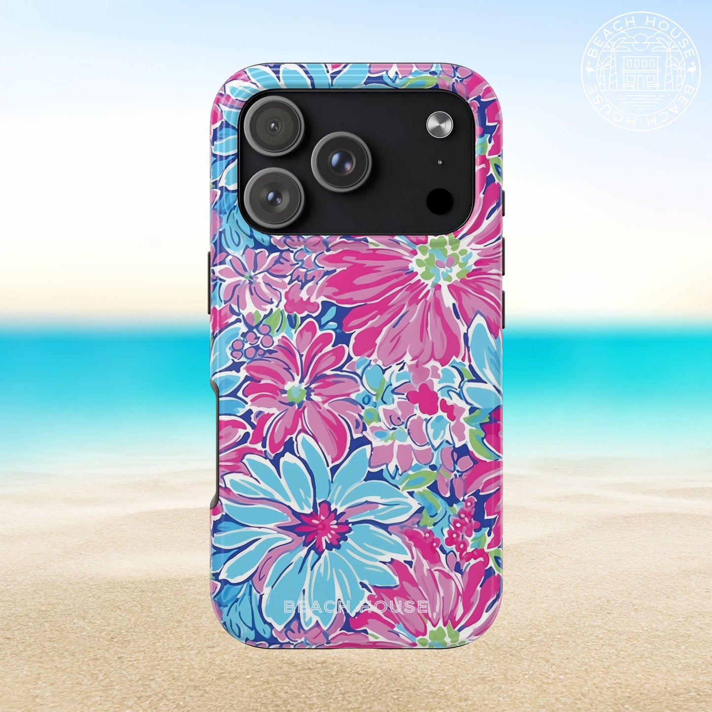 Bimini Tough Case for iPhone 17 Pro with pink and blue flowers on a beach background