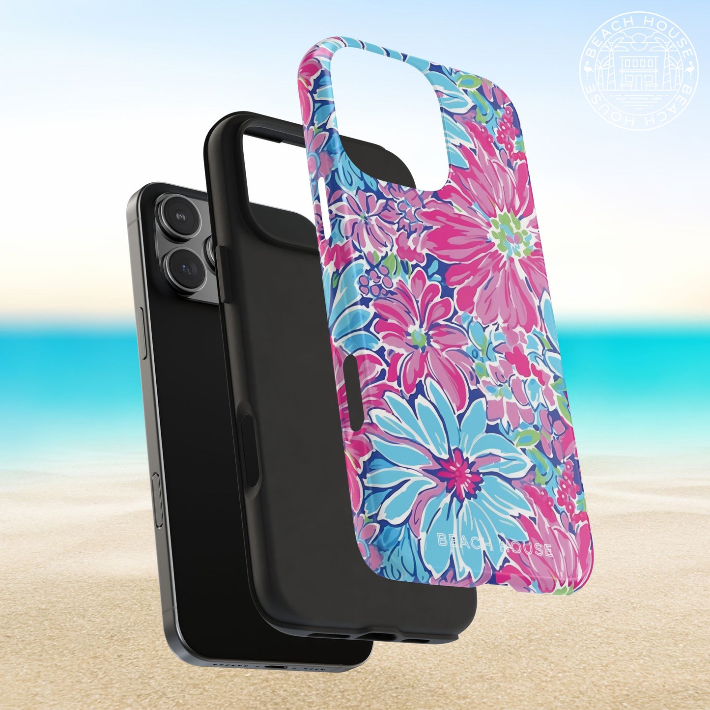 Protective layers of the Bimini Tough Case for iPhone on a smartphone with a beach background