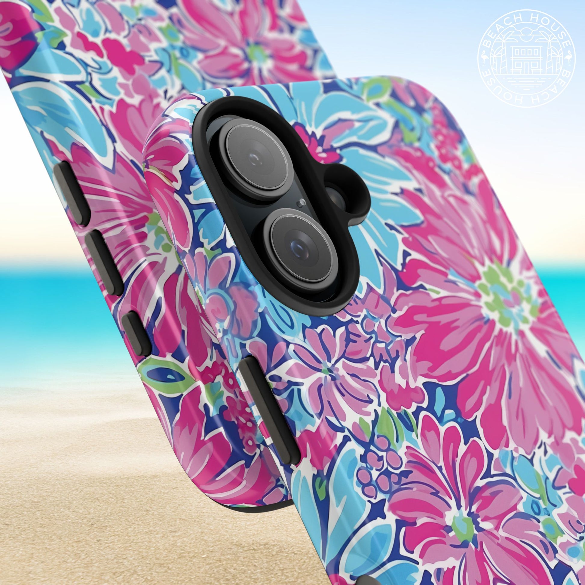 Close up views of the Bimini Tough Case for iPhone with pink and blue flowers on a beach background