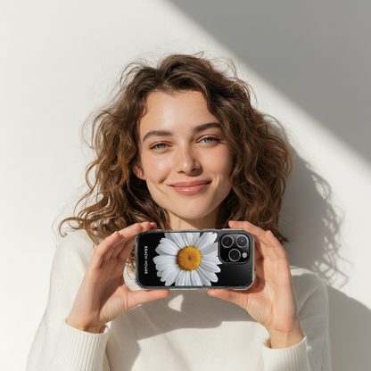 Woman holding a phone with a daisy case against a neutral background