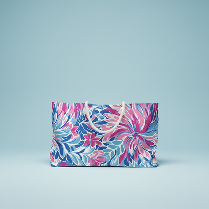 Floral patternedDestin weekender tote  bag on a light blue background