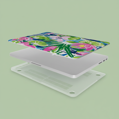 Top and bottom elements of the Everglades MacBook Case, with a macbook between them, on a green background