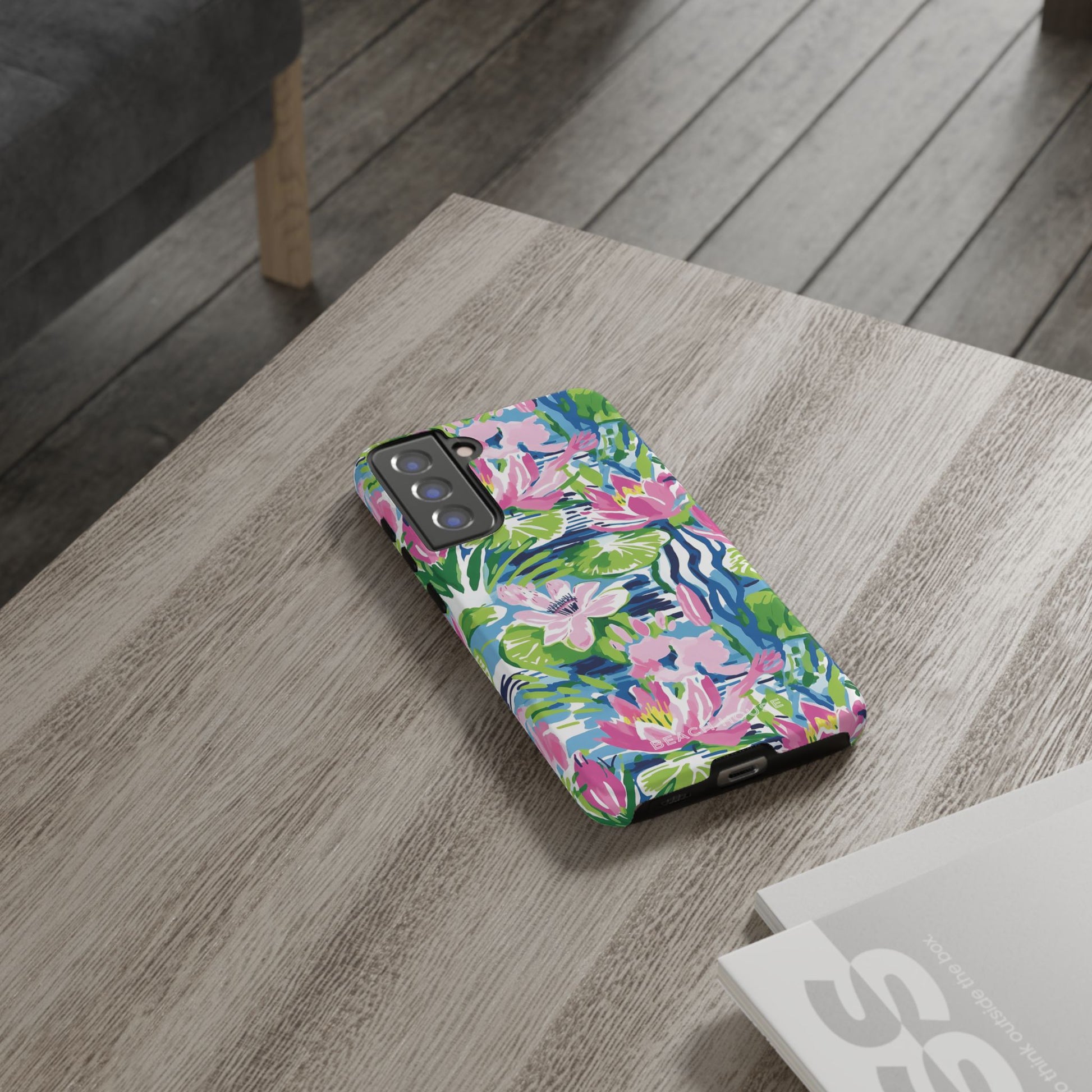 Everglades Tough Case for Galaxy with colorful floral pattern on a wooden table