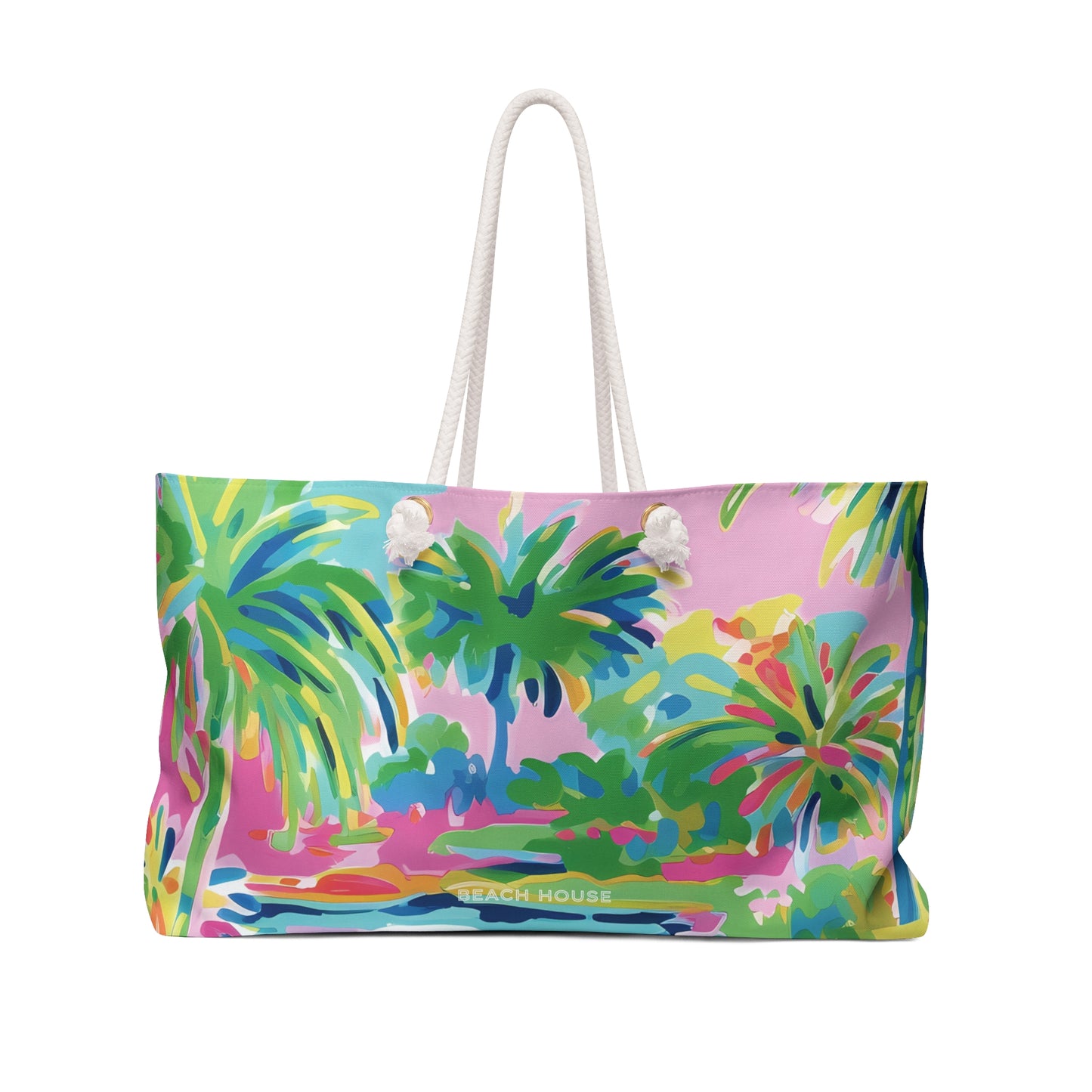Front view of colorful beach bag with coastal palm tree design on a white background