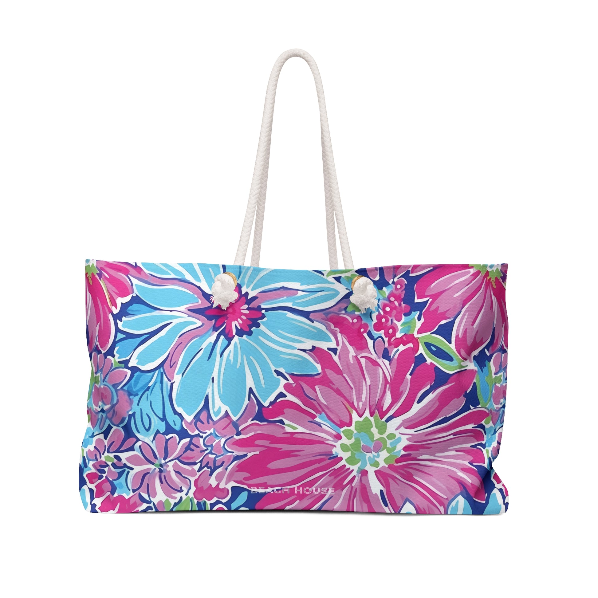 Front view of the pink and blue floral Bimini Weekender Tote Bag on a white background