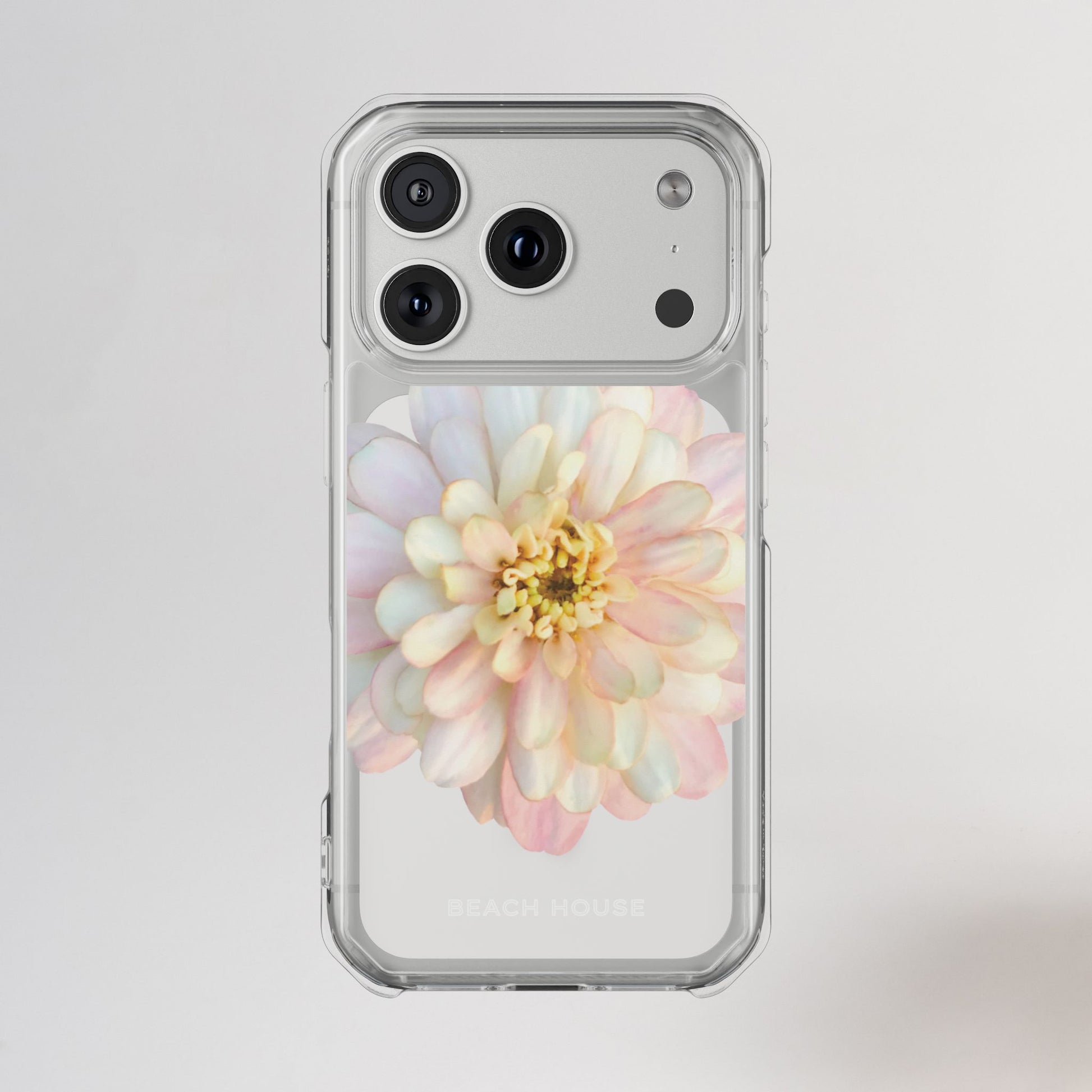 Phone case with a pastel flower design on a light gray background