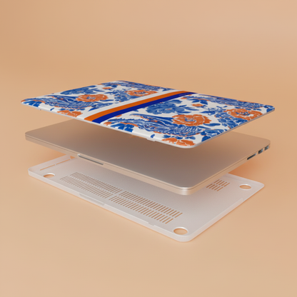 Top and bottom layers of the Gainesville MacBook Case with a laptom on a beige background