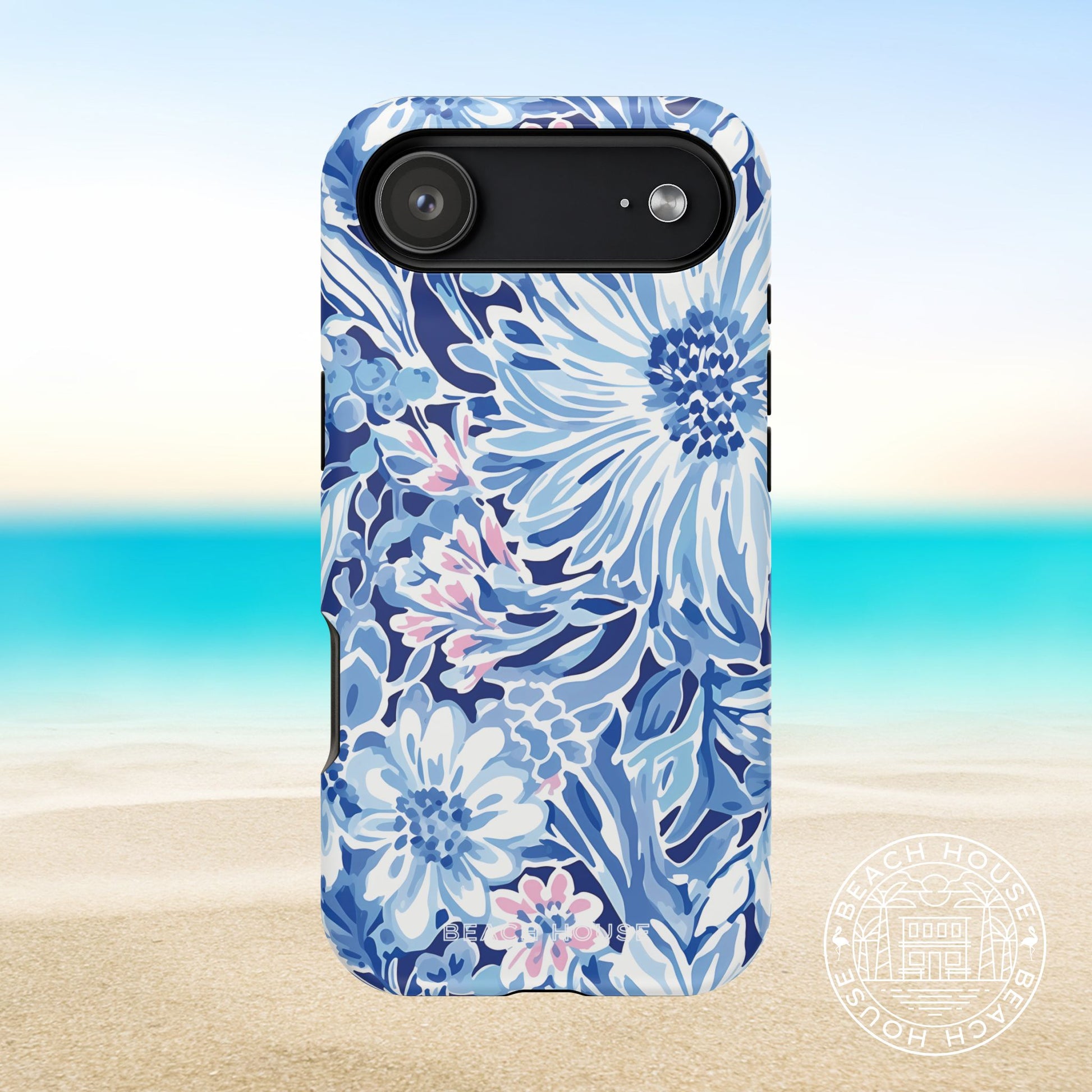 Huntington MagSafe Tough Phone case for iPhone 17 Air with blue floral pattern on a beach background