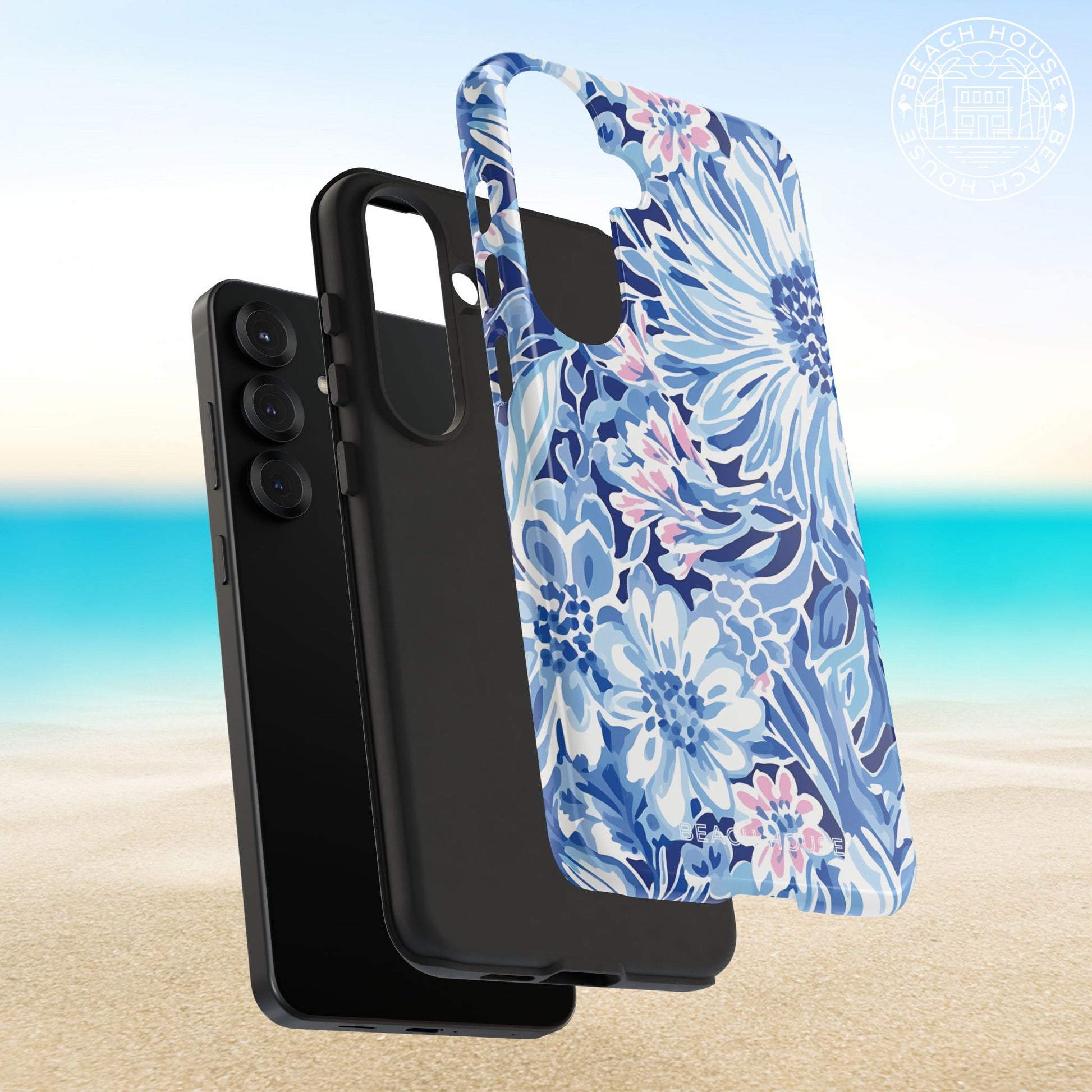 Layers of the Huntington Tough Case for Galaxy with black phone on a beach background