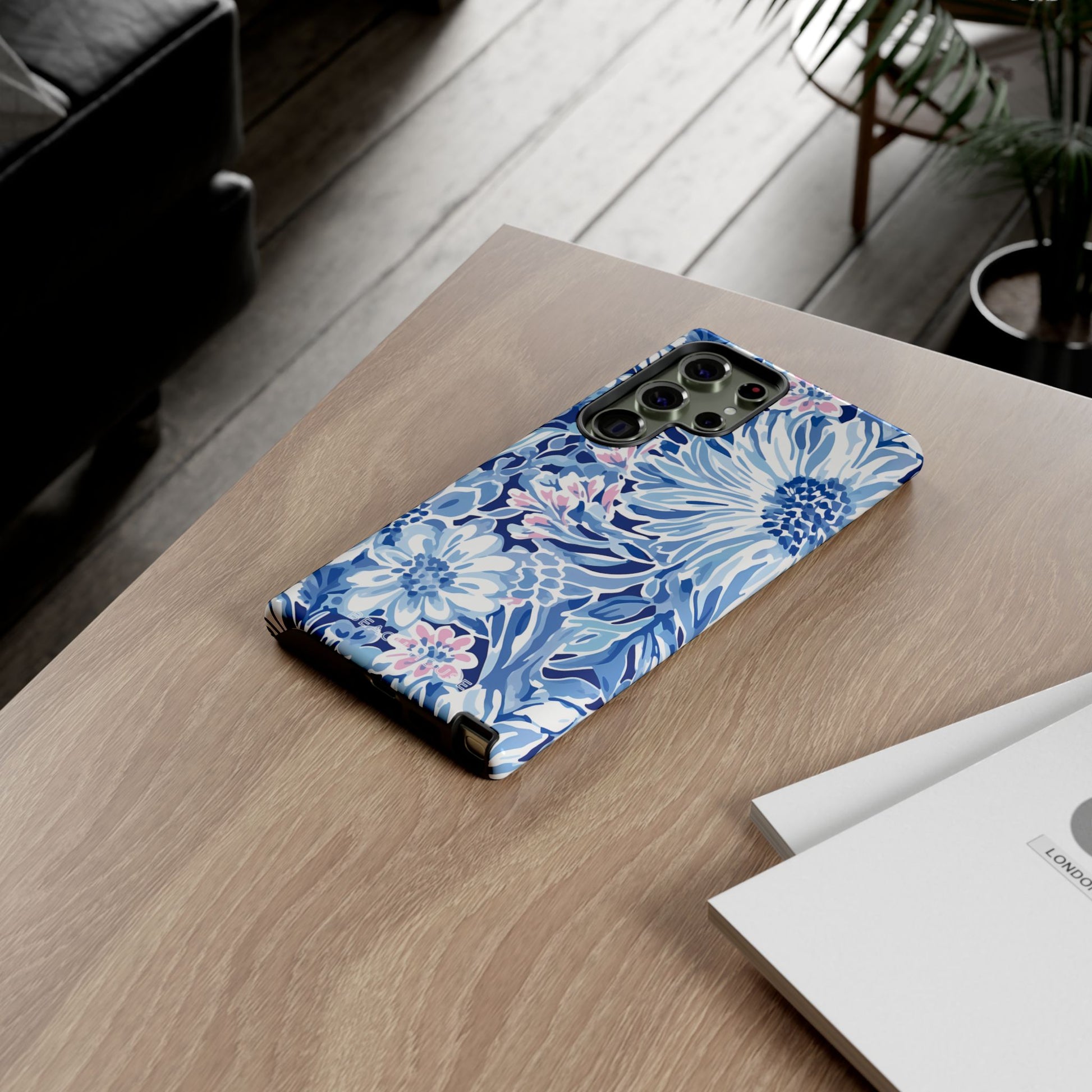 Huntington Tough Case for Galaxy with blue floral pattern on a wooden surface