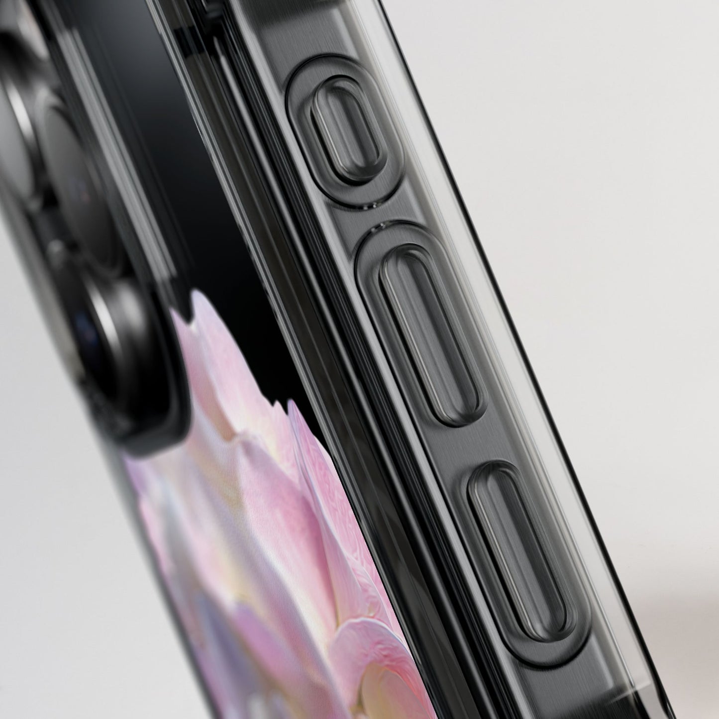 Close-up of a phone case with floral design on a light gray background