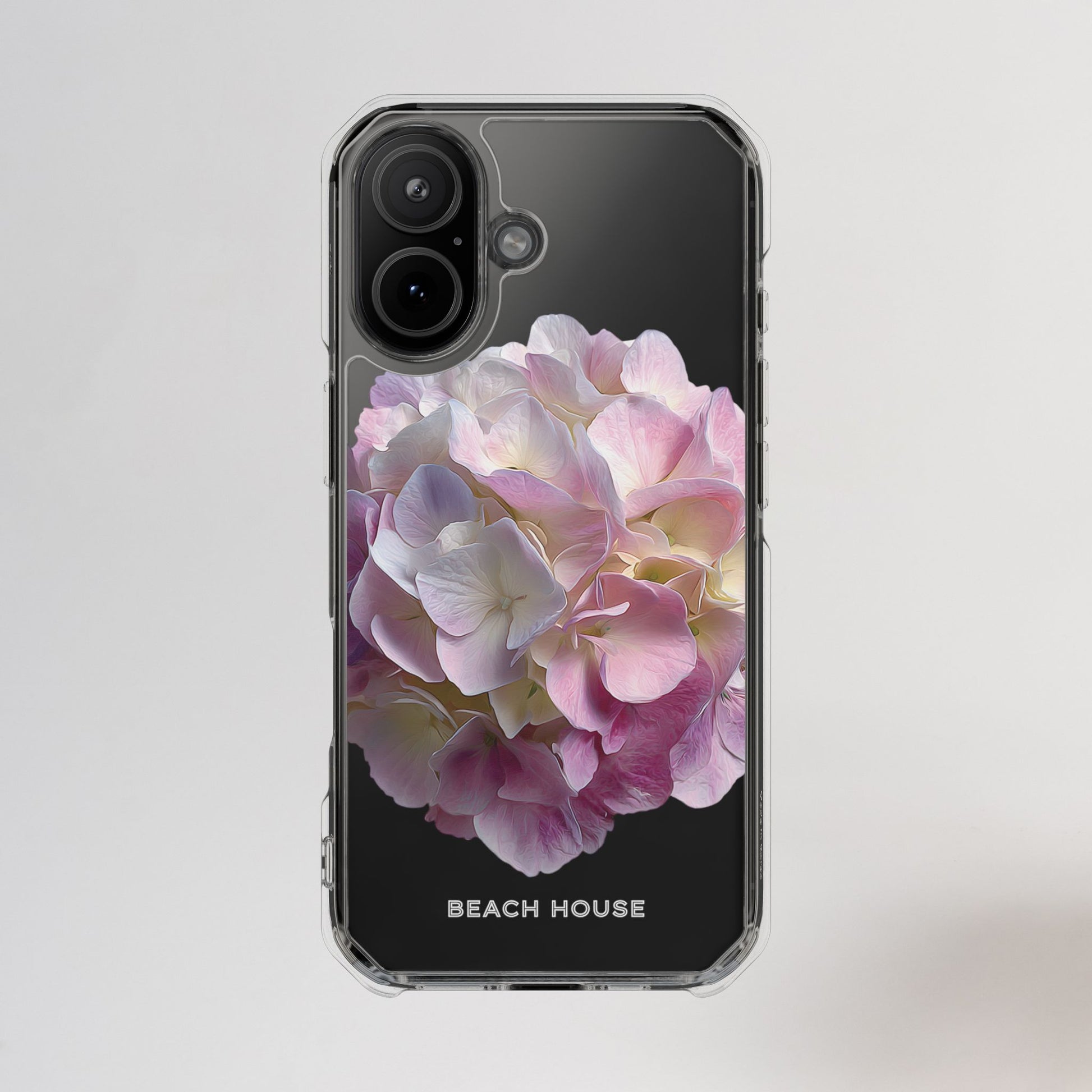 Phone case with pink flower design on a light gray background