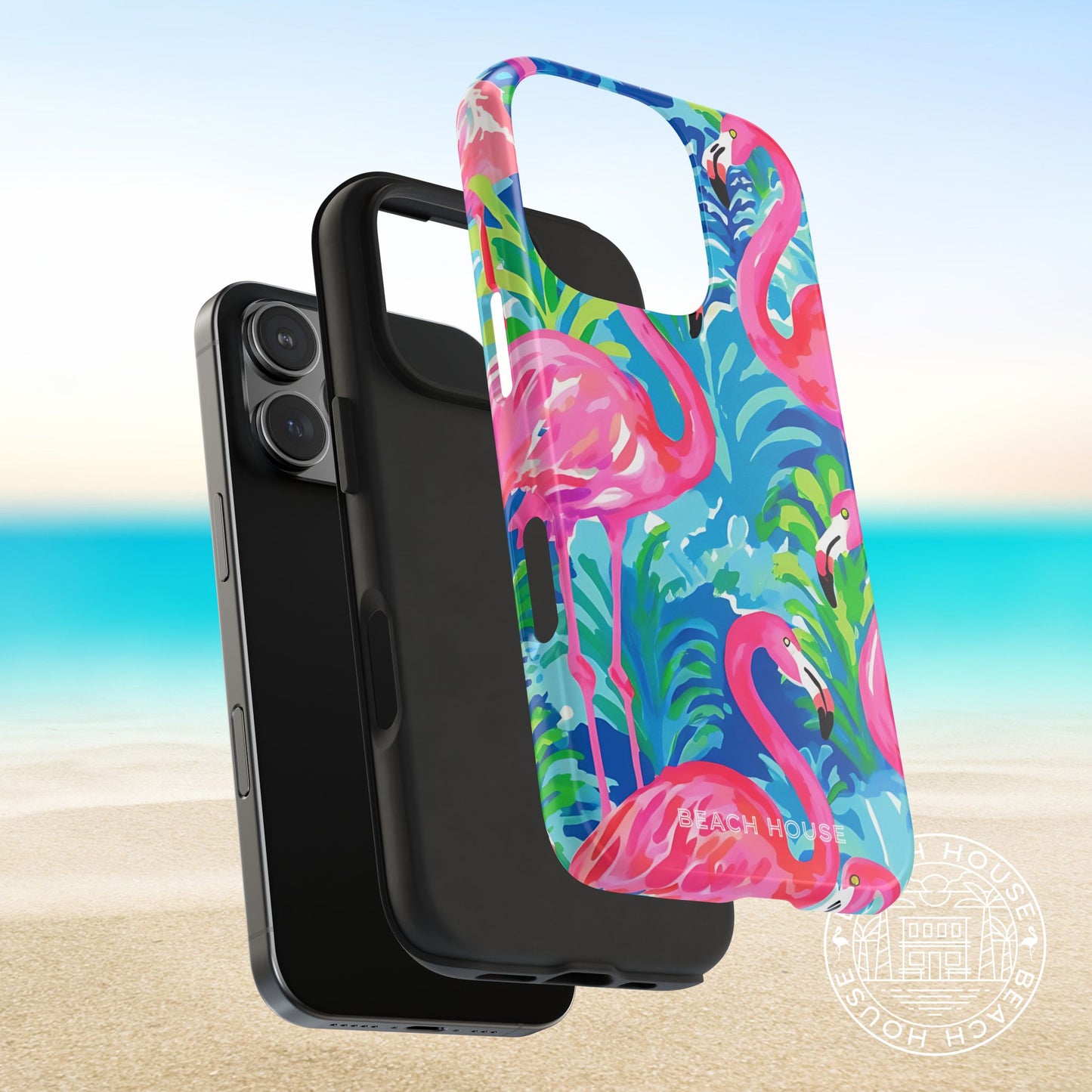 Protective polycarbonate shell and shock absorption liner layers of the Key Largo Tough Case for iPhone, next to a phone